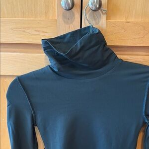 Aritzia dark green turtleneck bodysuit.